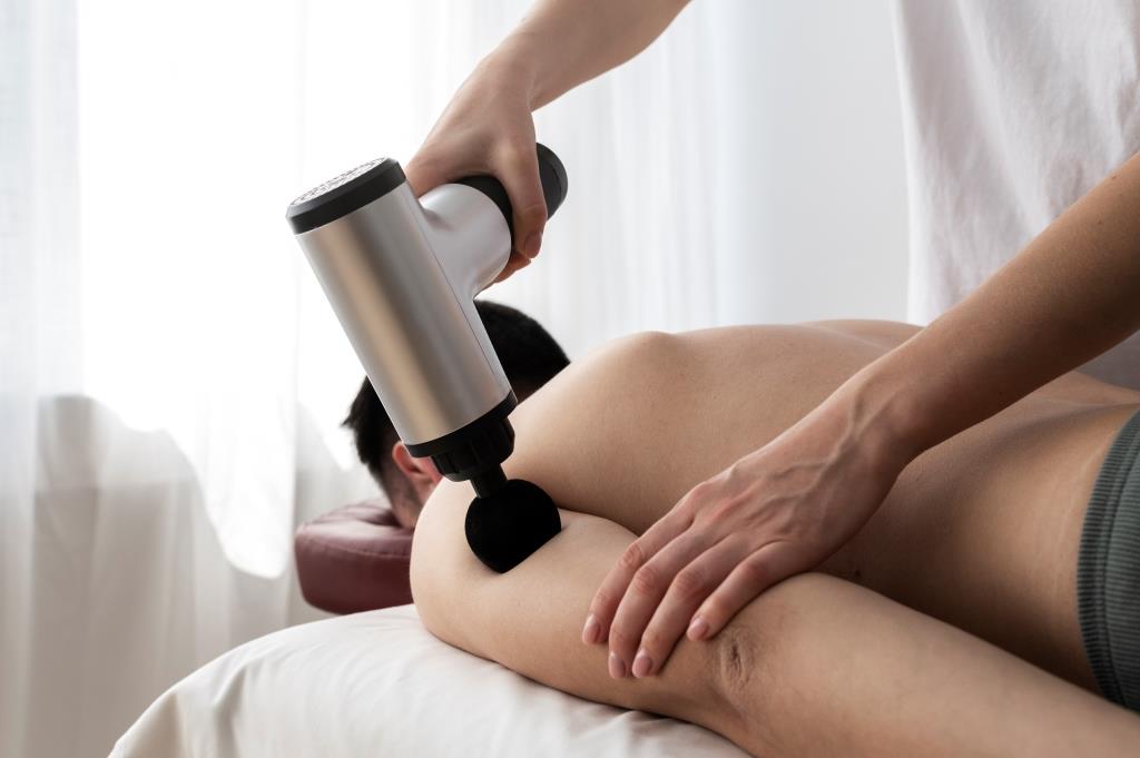 person-using-massage-gun (1).jpg